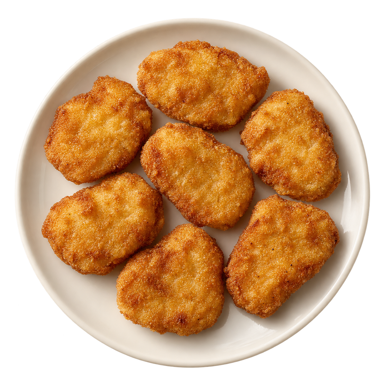 Golden chicken nuggets on an ivory plate